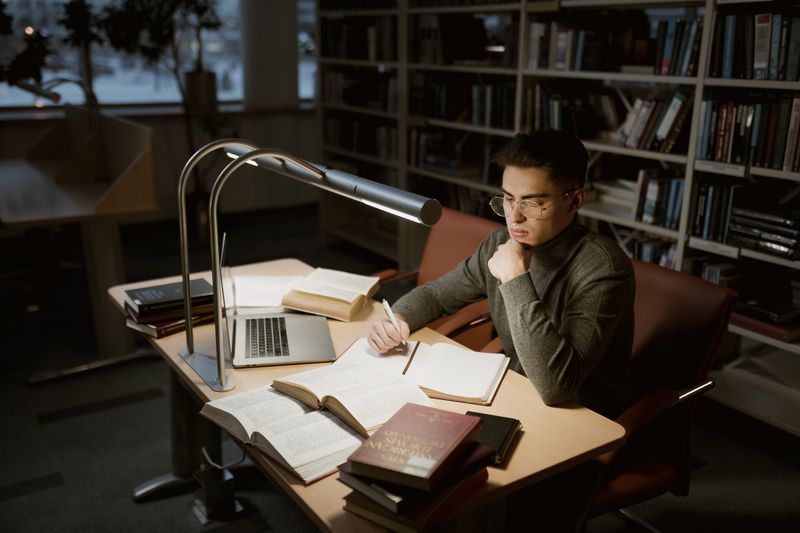 Student building a balanced college list while studying