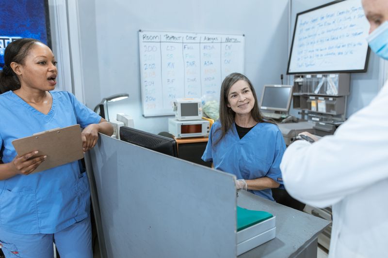 Hospital staff working at a reception area during a Dallas hospital internship for high school students