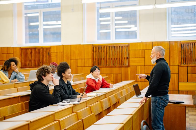 Instructor teaching a lecture hall of students in a Georgetown Summer College course