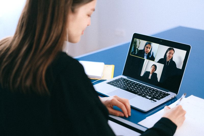 Student on a video call discussing a Google program application