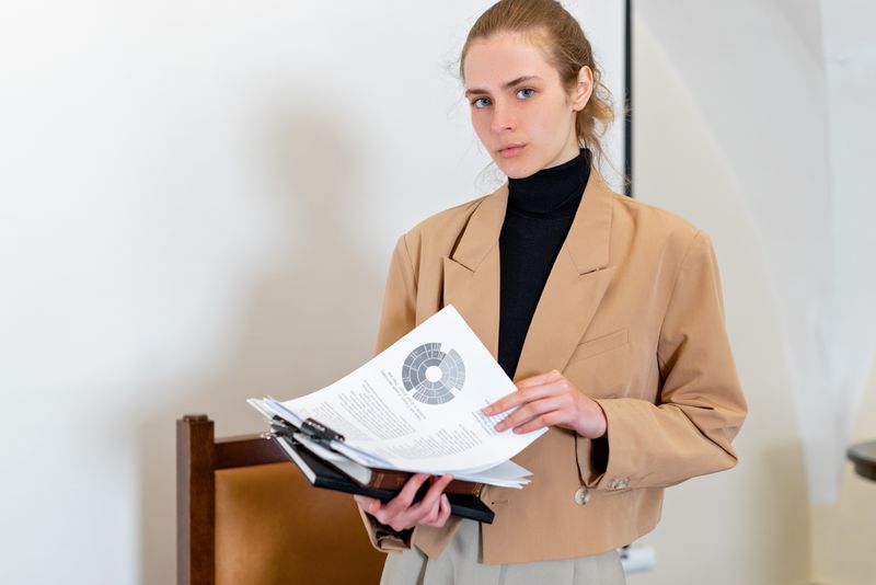 Student reviewing copyright and permission requirements for an ISEF poster
