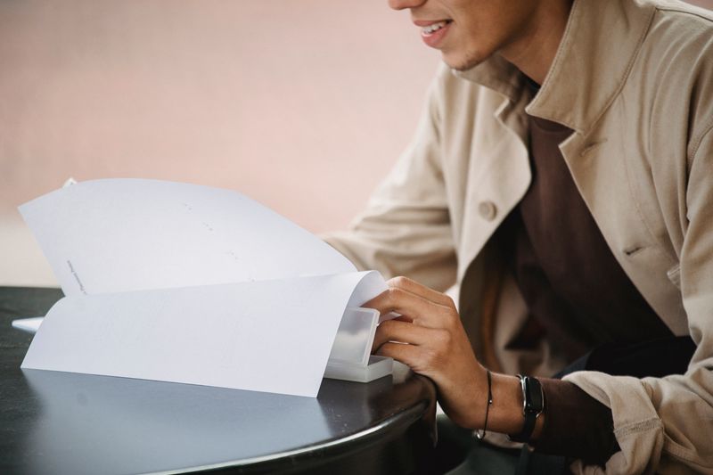 Student formatting each citation on an ISEF poster step by step