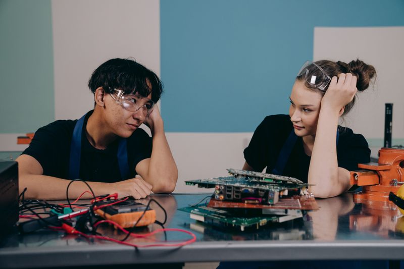 Students researching how to find a STEM internship in high school