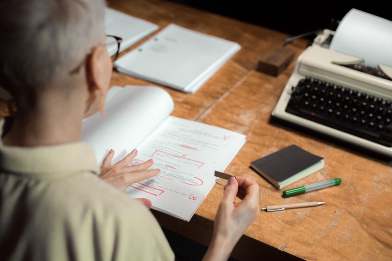 Student reviewing common mistakes in draft Ivy League essays