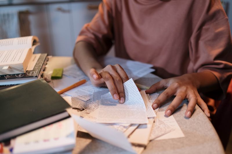Student revising a draft of an Ivy League essay through multiple passes