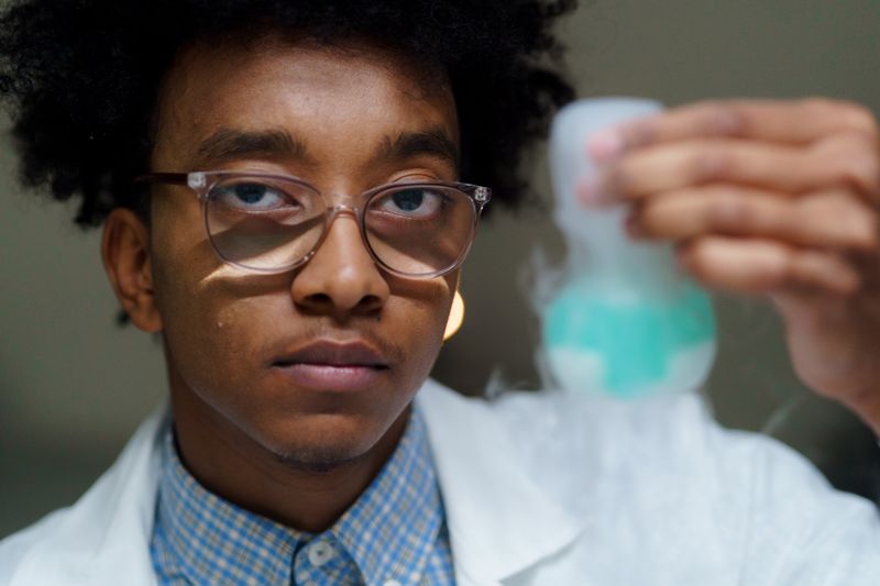 Student meeting age requirements for a medical internship in a lab setting