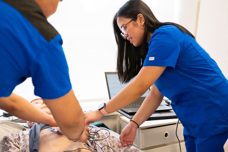 Student gaining experience relevant to college admissions through a medical internship