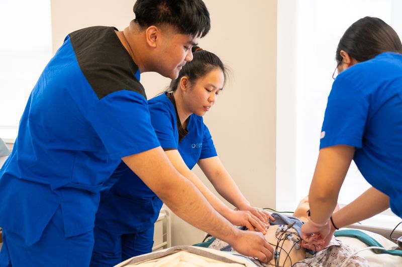 Students practicing hands-on skills in a medical internship program