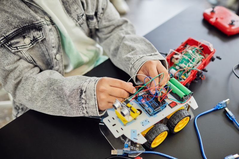 Students working on a robotics build representing a Science Olympiad event category