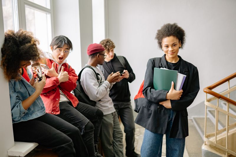 Students in a school hallway on the day of a Science Olympiad tournament