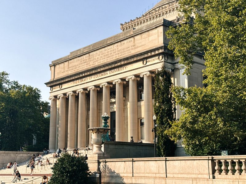 University library building representing competitive summer research programs for high school students